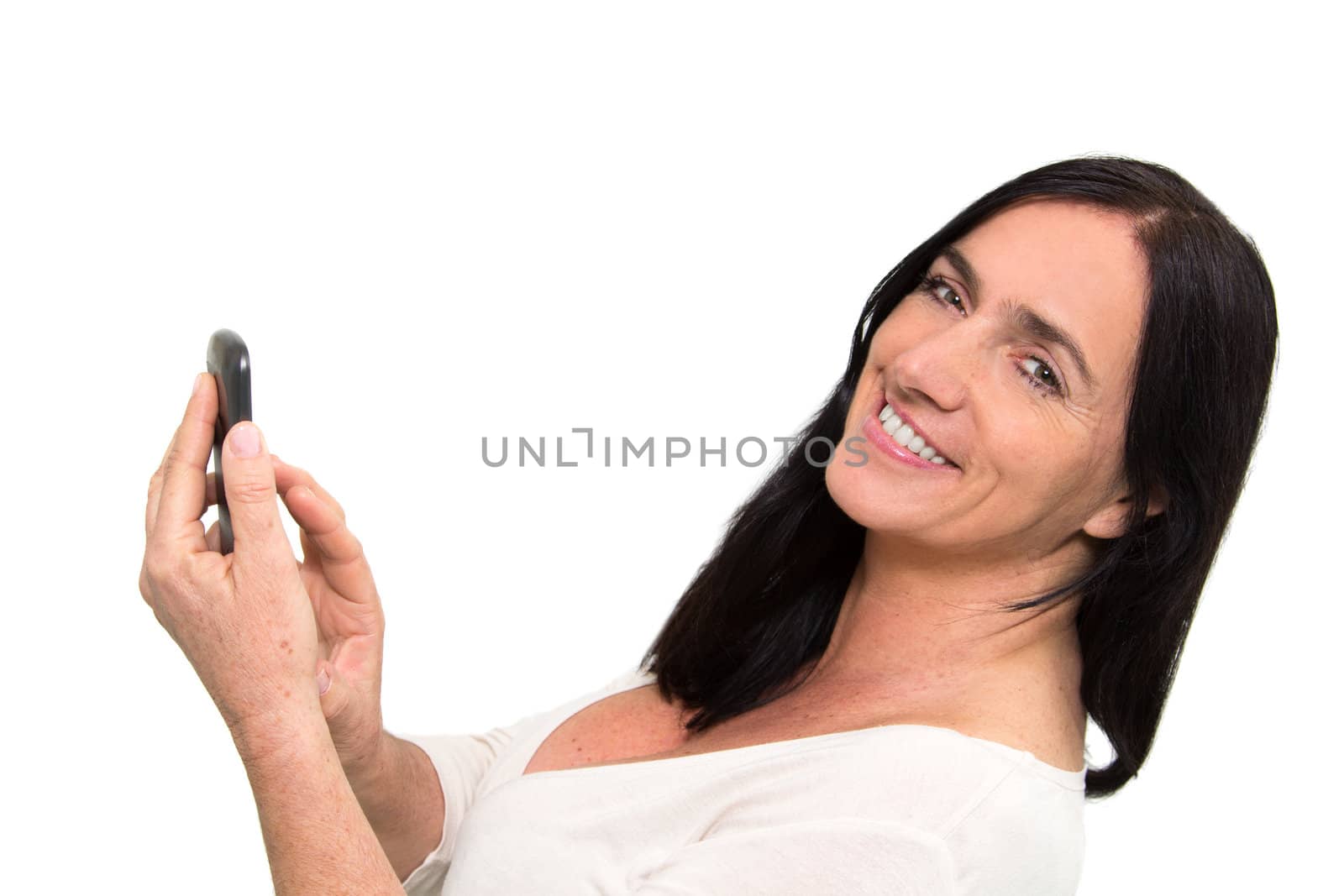 Dark haired woman using a Smartphone by dwaschnig_photo