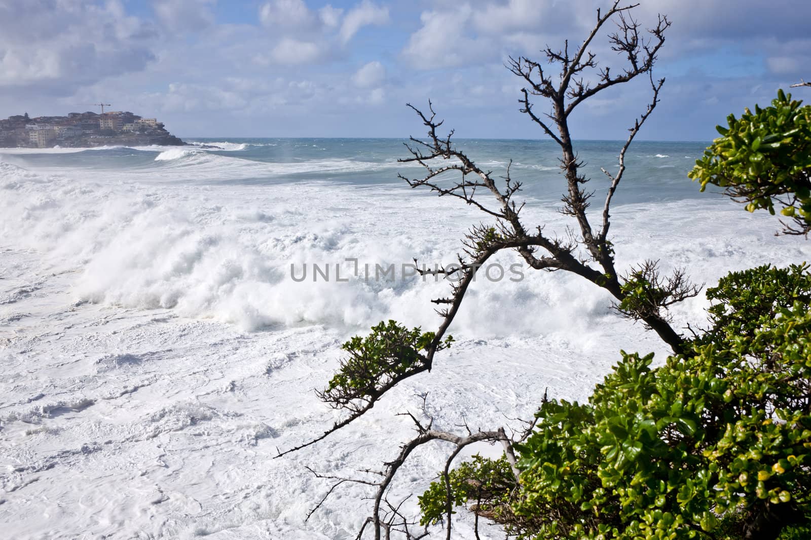 Powerful waves racing ashore by jrstock