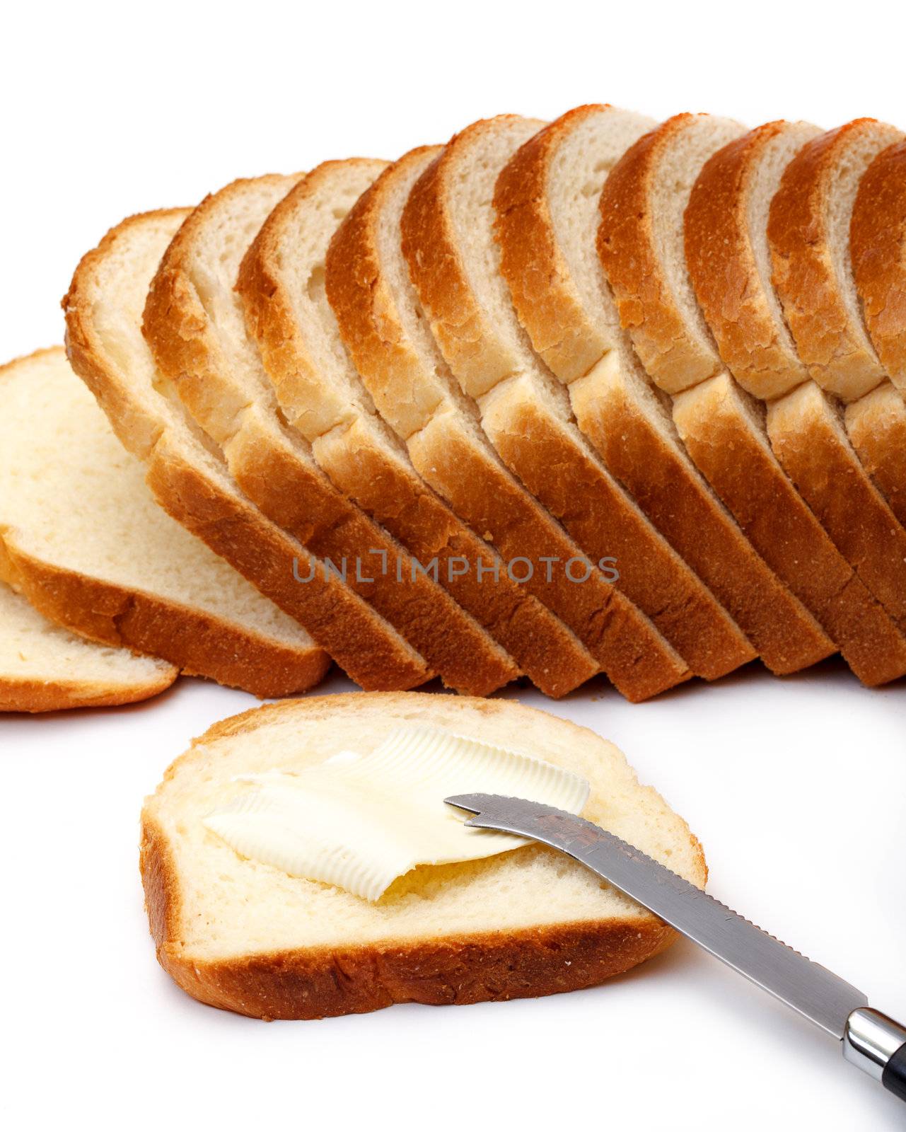 Slices of Wheat Bread with Butter by Discovod