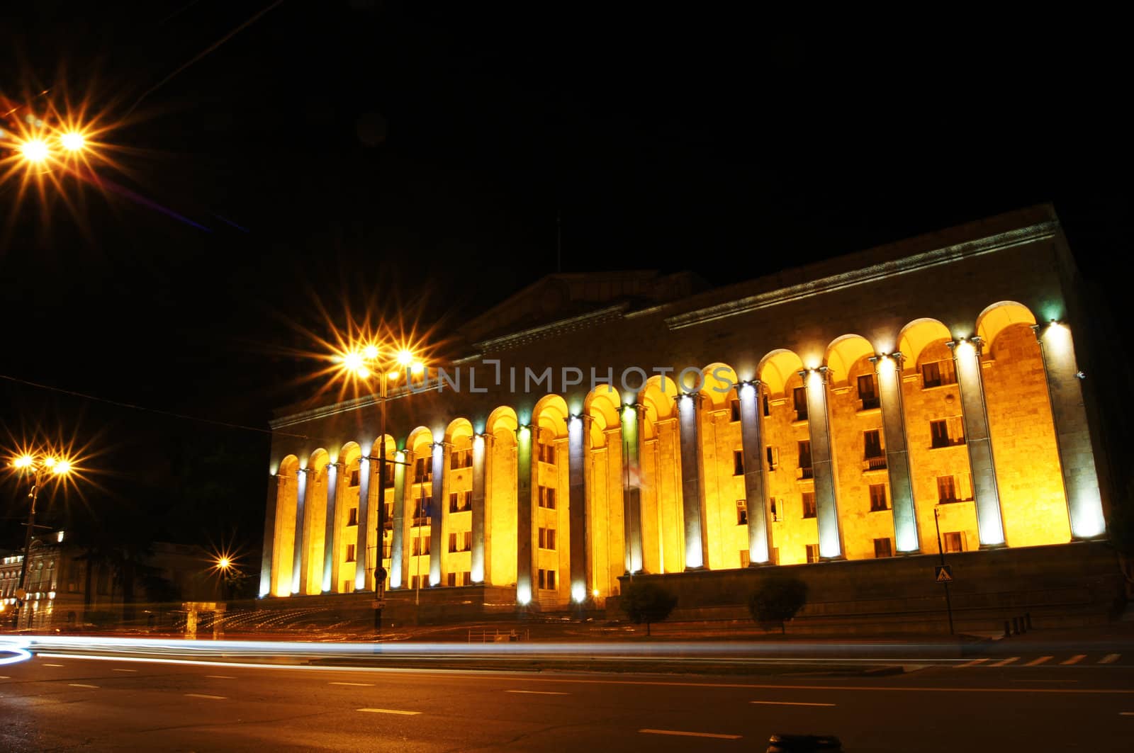 Night view of Tbilisi Old town with ancient churches, castle and president palace by Elet