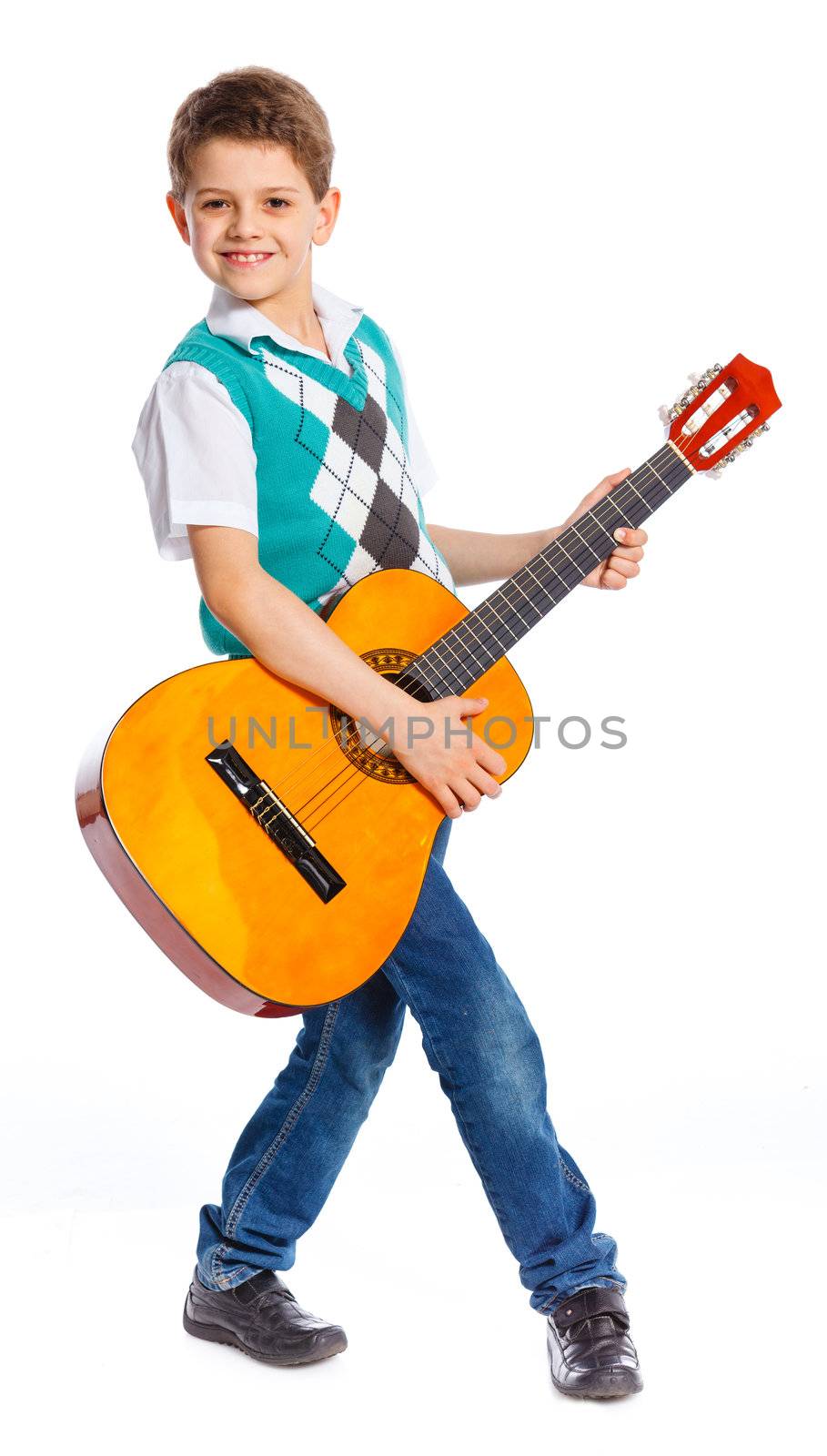 Cute boy with classical guitar. Isolated on white background