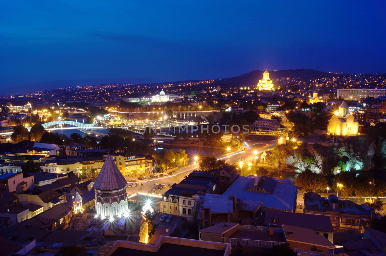 Night view of Tbilisi Old town with ancient churches, castle and president palace by Elet