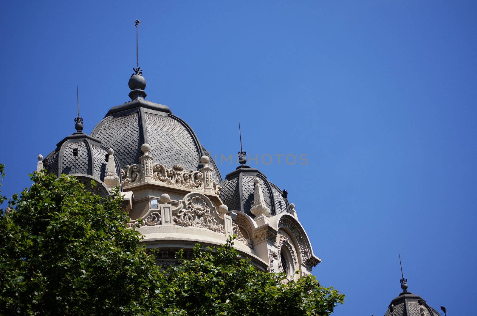 Facade of Barcelona buildings in center, Spain by Elet