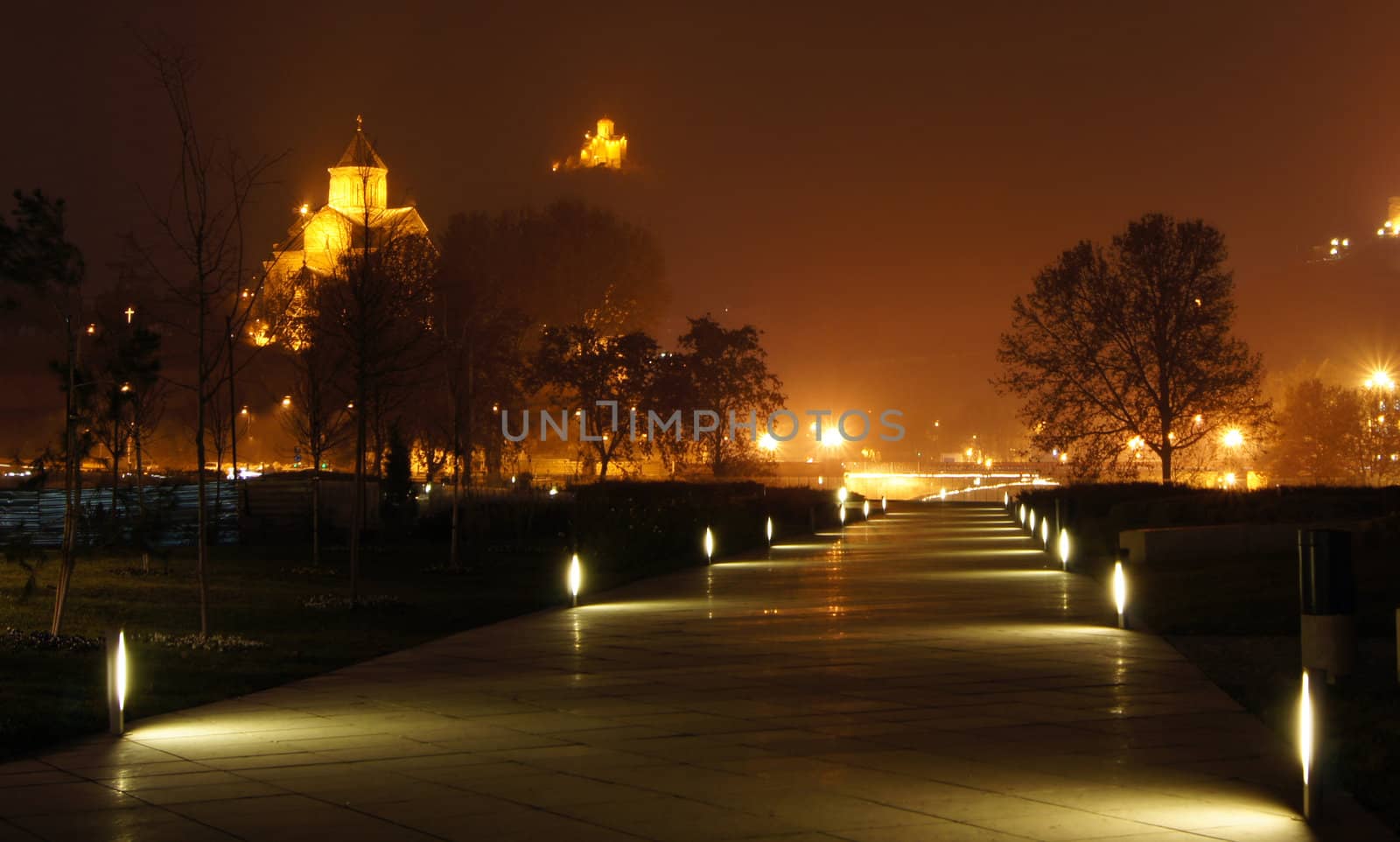 Night view of Tbilisi Old town with ancient churches, castle and president palace by Elet