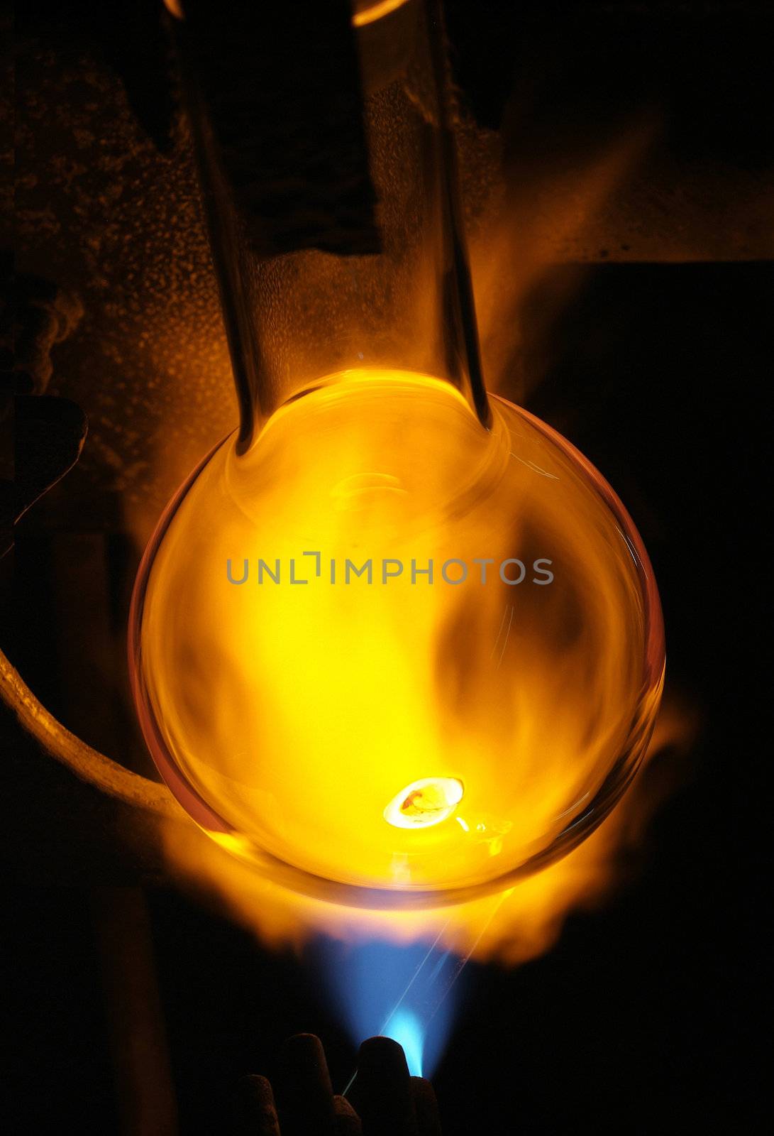 Chemical glassware with fire background