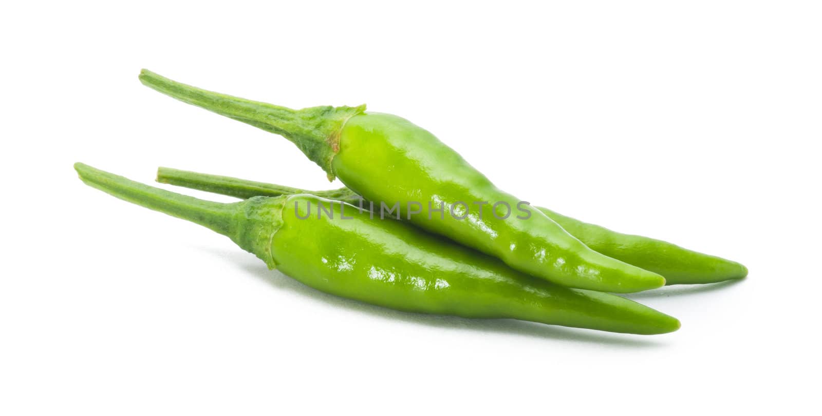 green chili on white background