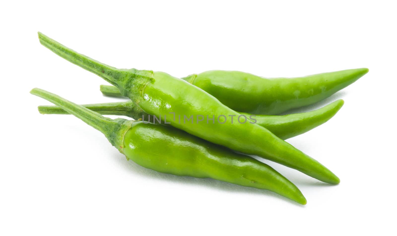 green chili on white background