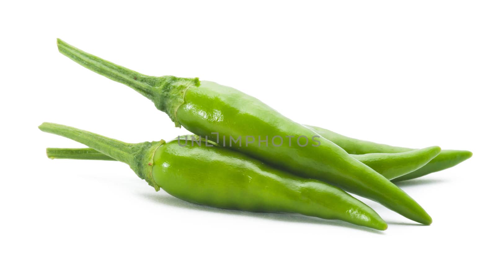 green chili on white background