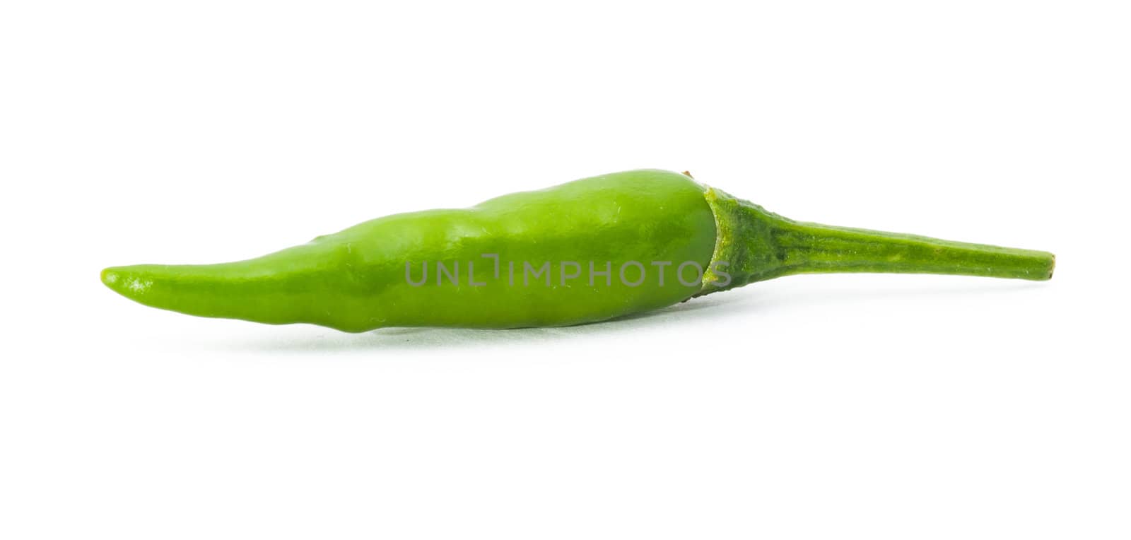 green chili on white background