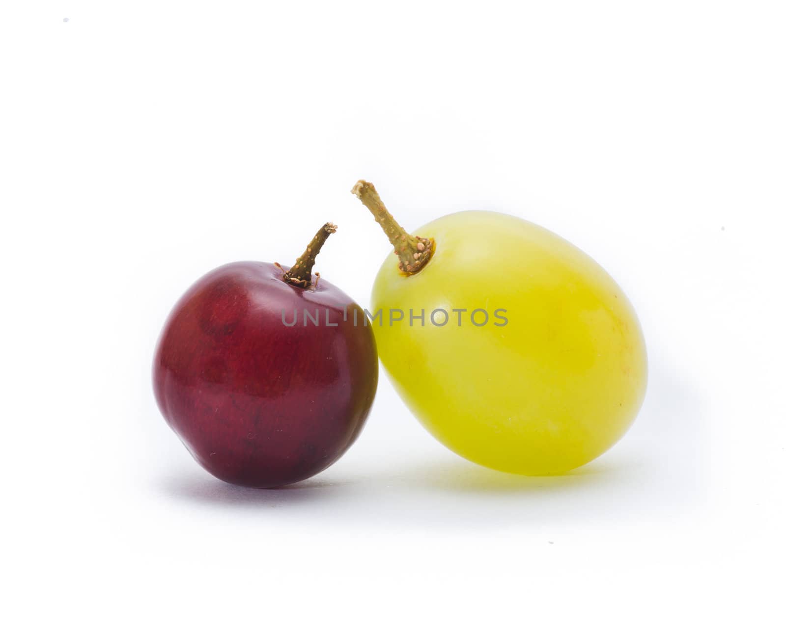 red and green grapes isolated on white