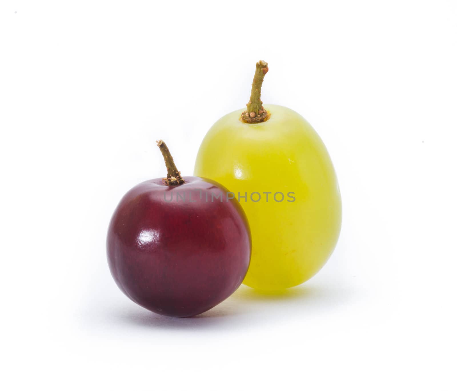 red and green grapes isolated on white