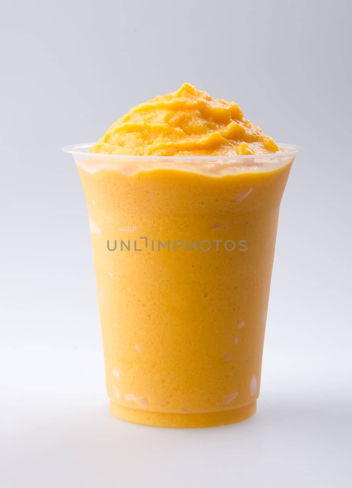 mango yogurt, milk shake isolated on white by heinteh