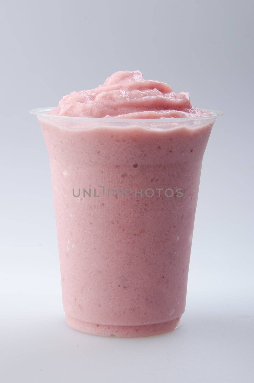 strawberry yogurt isolated on white by heinteh