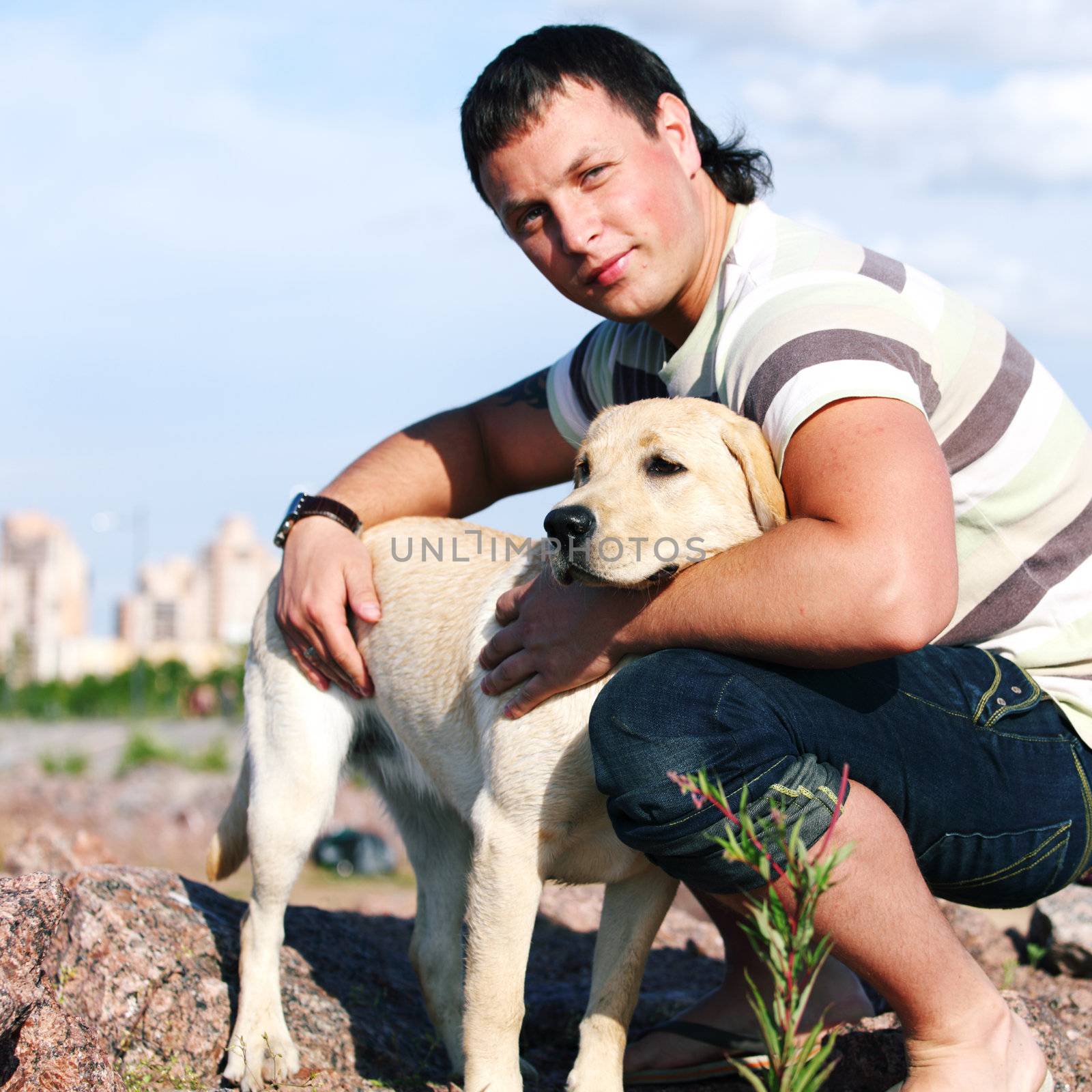 man and dog blue sky on background