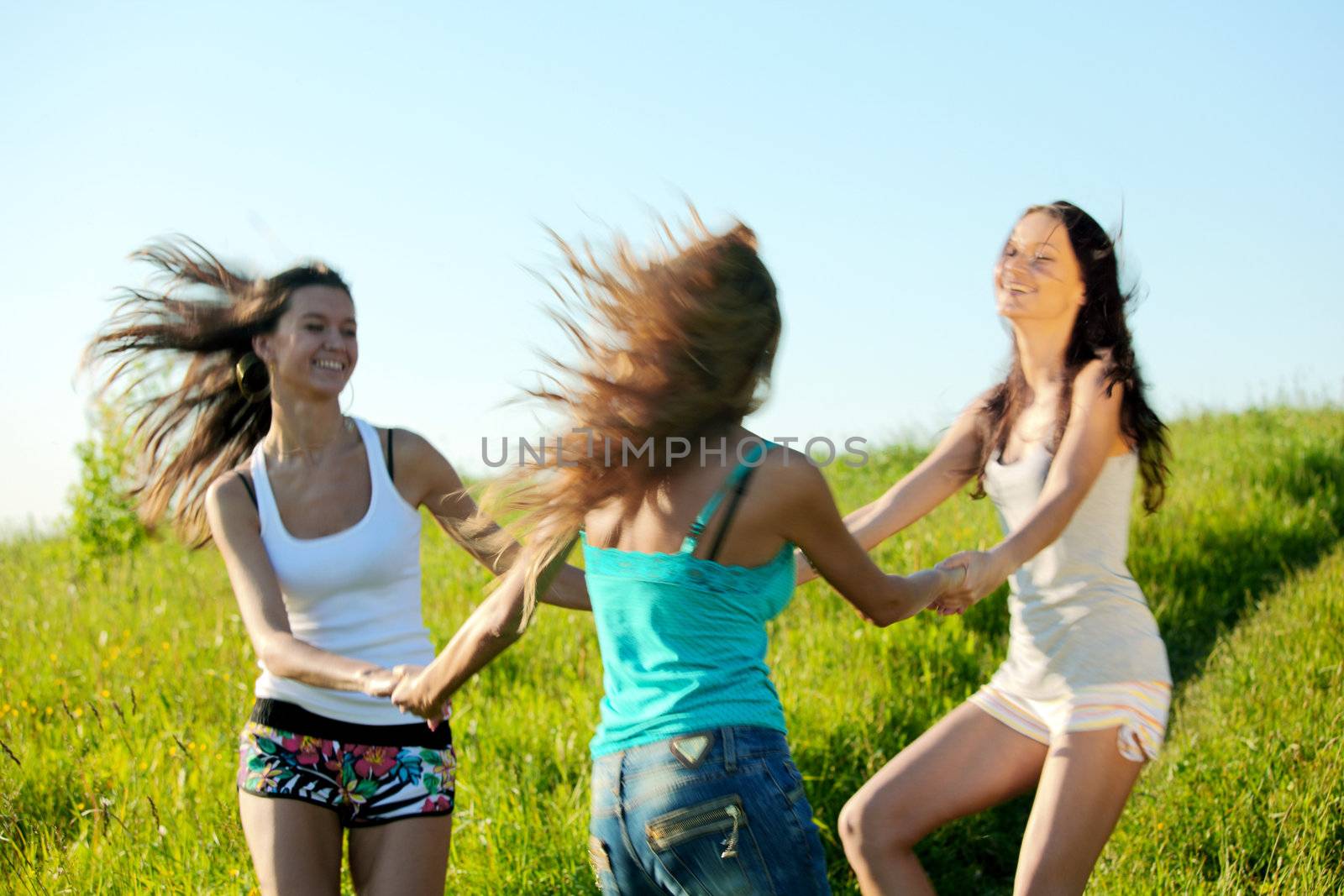 women fun on grass field