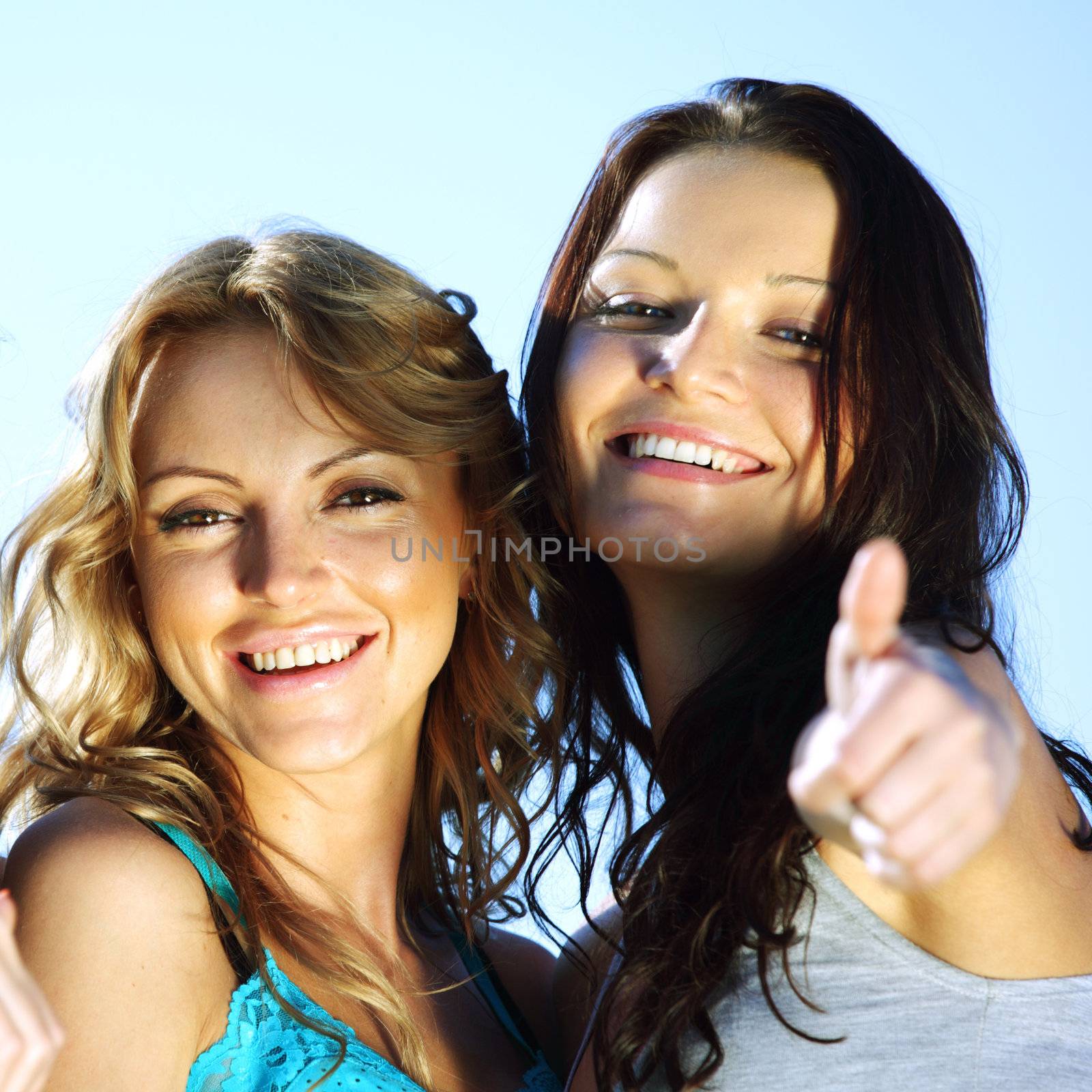 summer girlfriends in sun ligt happy and smile