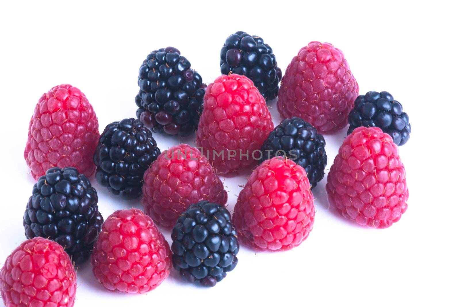 raspberry and blackberry on white isolated background