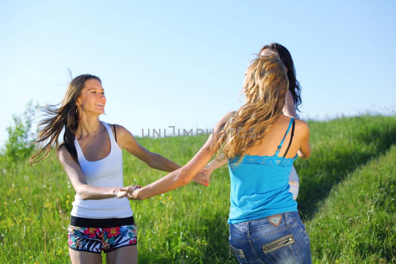 women fun on grass field