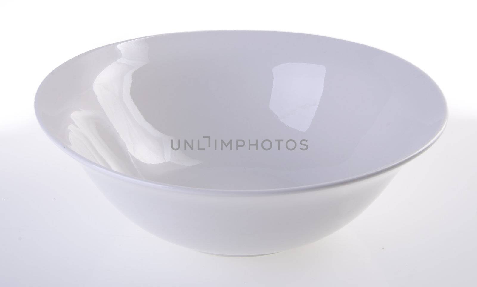 White ceramic bowl on white background