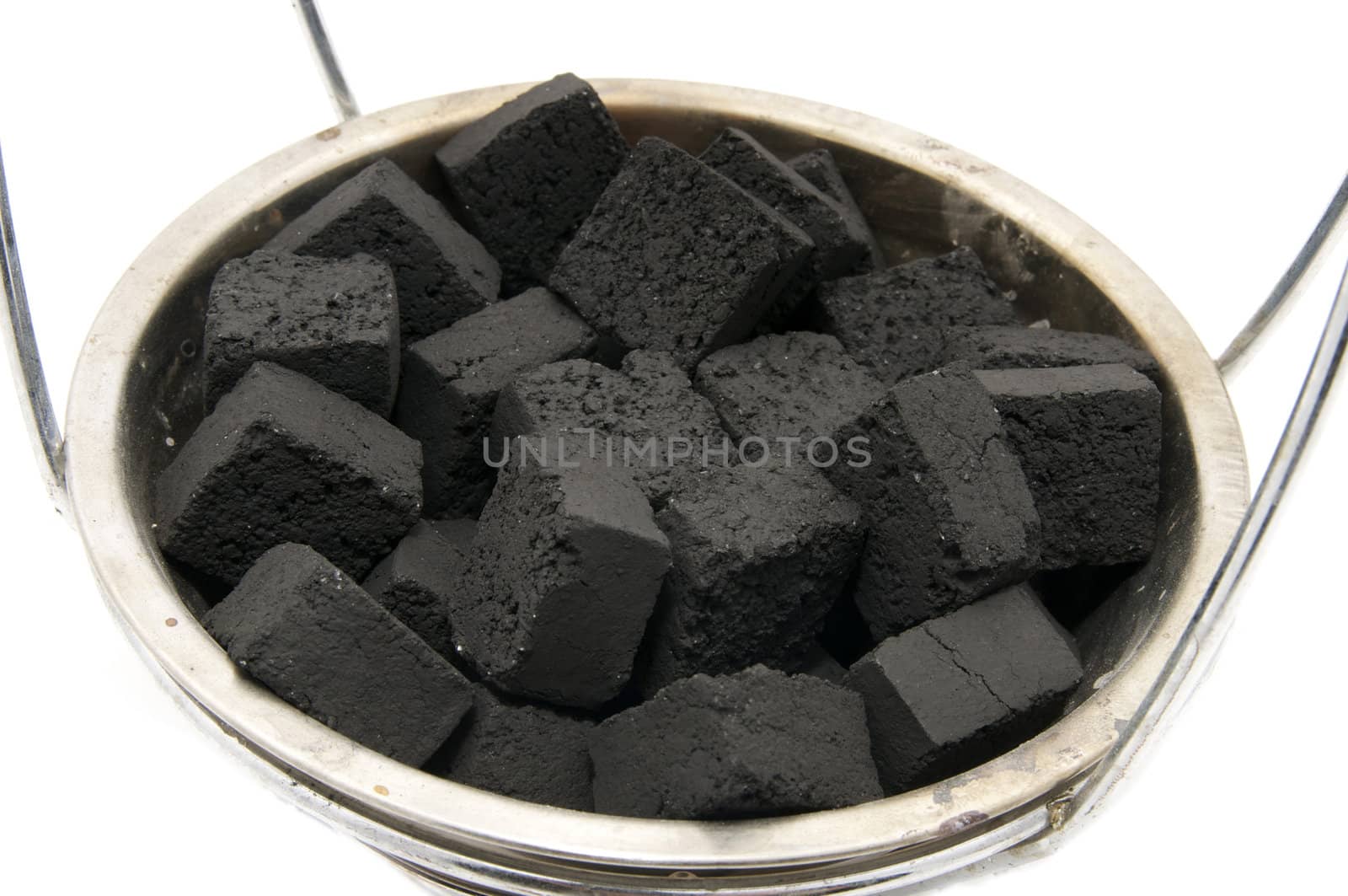 for hookah coals in an iron plate on a white background
