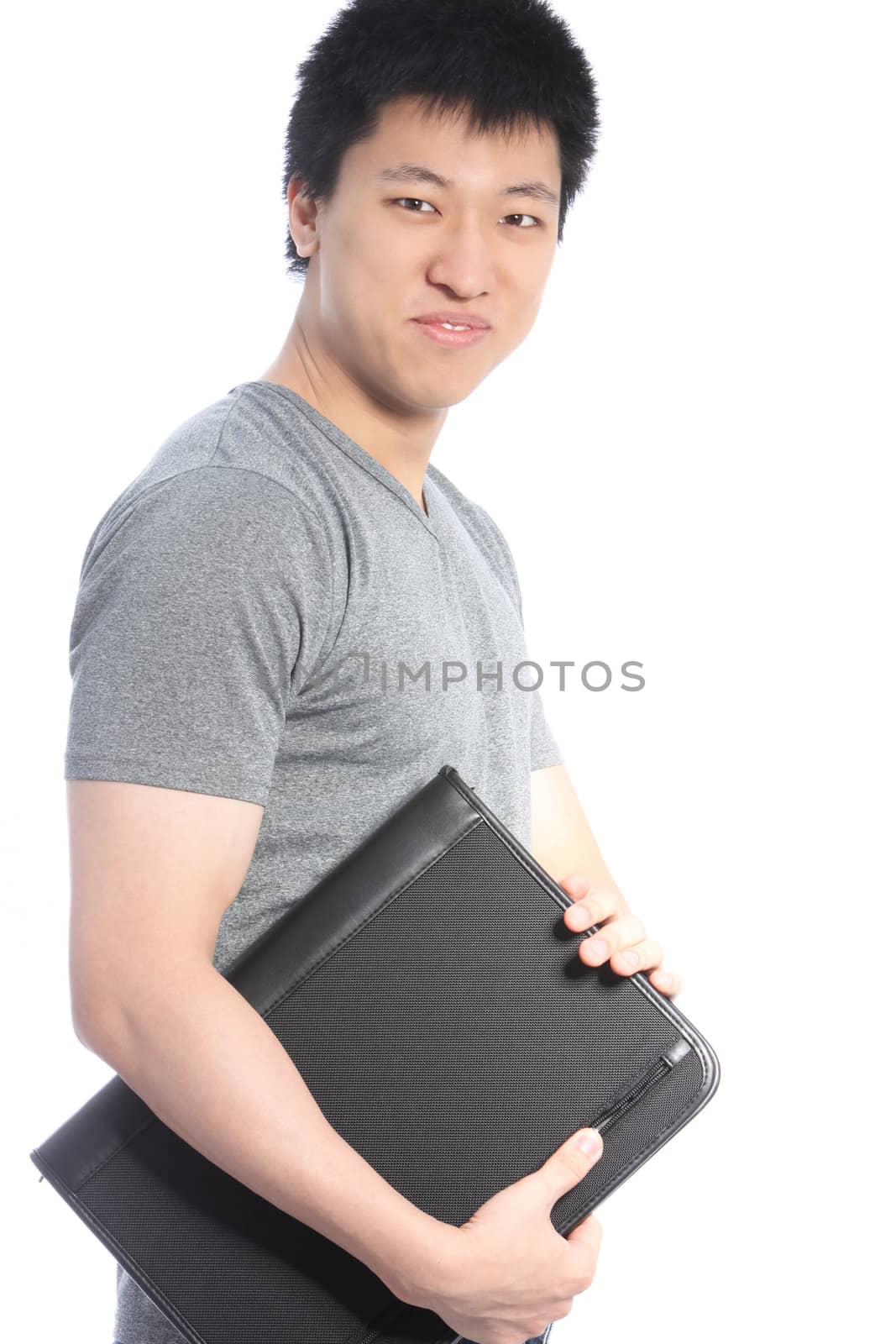 Young Asian Man Holding a Black Binder by Farina6000