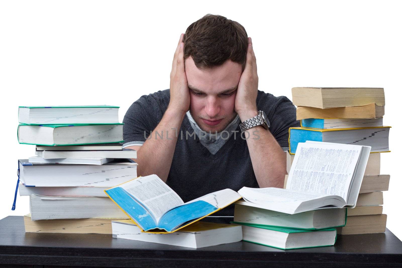 Young Student overwhelmed with studying by dwaschnig_photo
