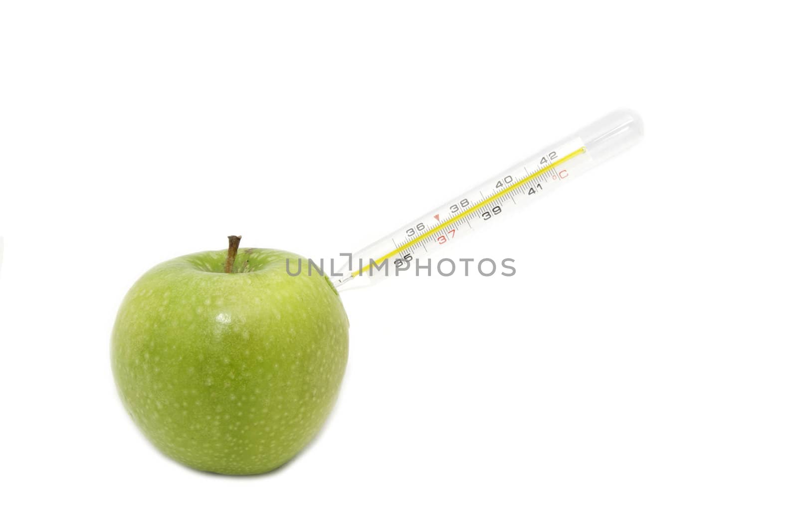 green apple and a medical thermometer on white background