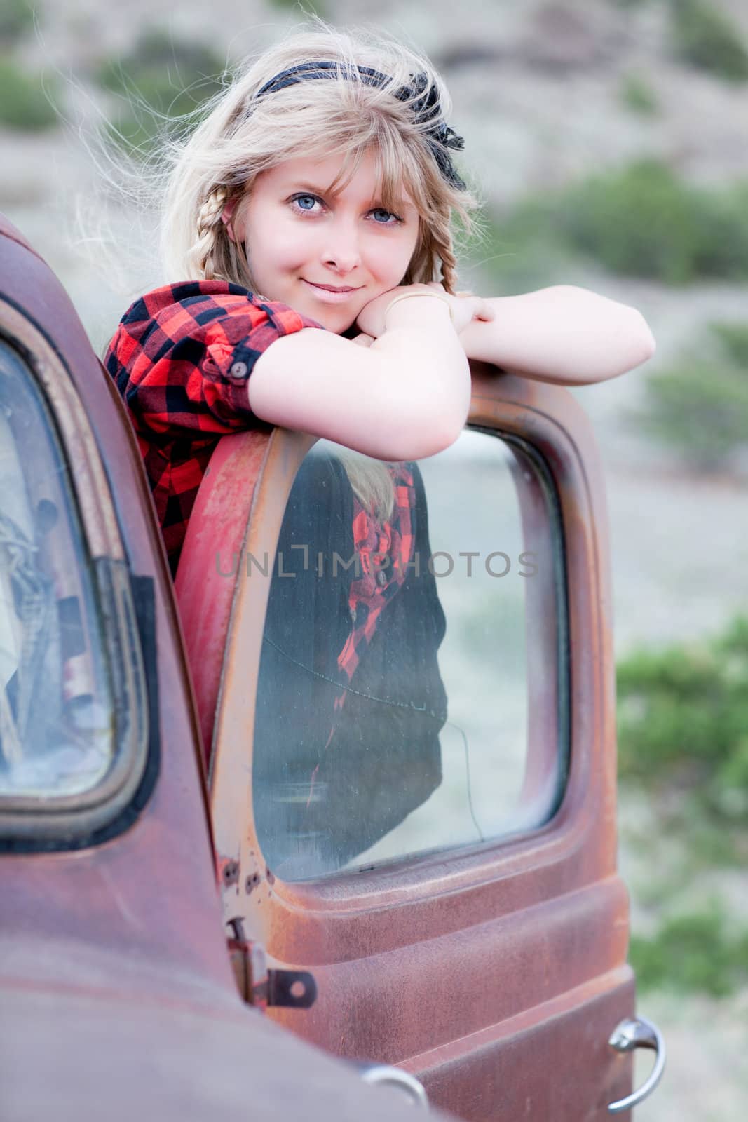 Pretty Blonde Girl in a Vintage old truck