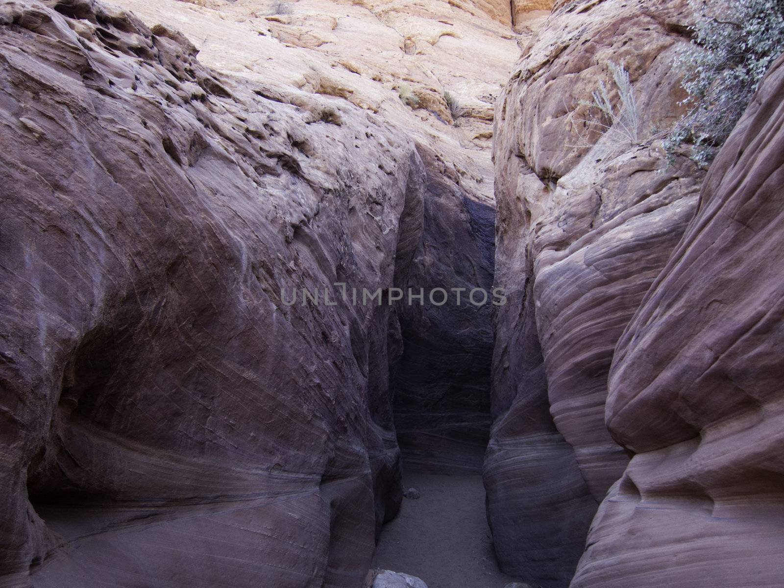 entrance to slot canyon hiking by kjcimagery
