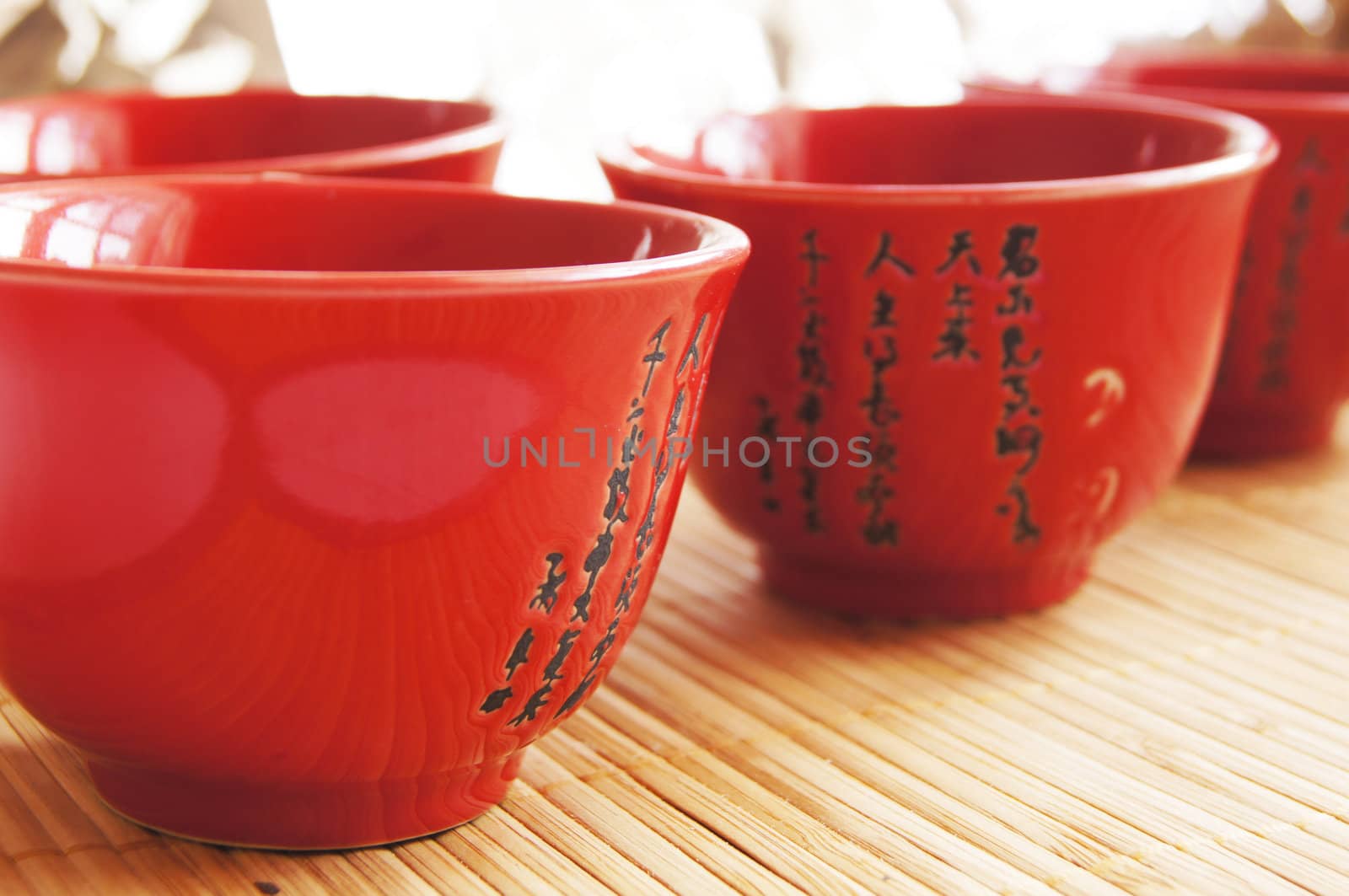 Closeup of set of China tea on bamboo mat by Elet