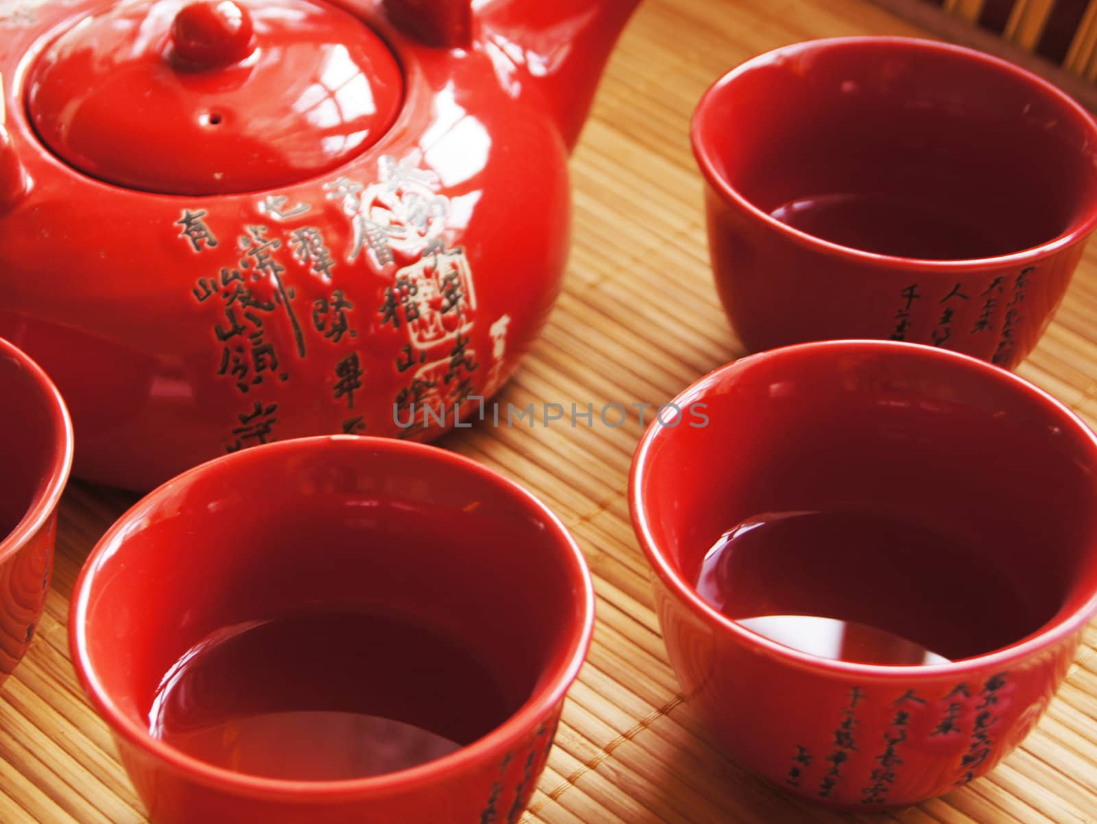 Closeup of set of China tea on bamboo mat by Elet