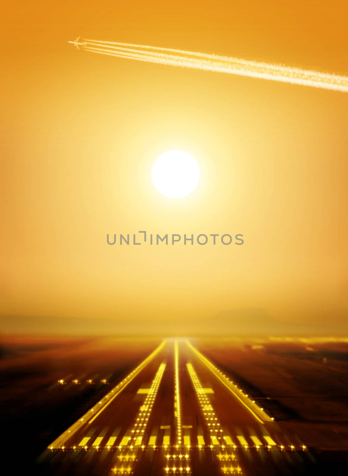 passenger plane fly up over runway from airport at sunset