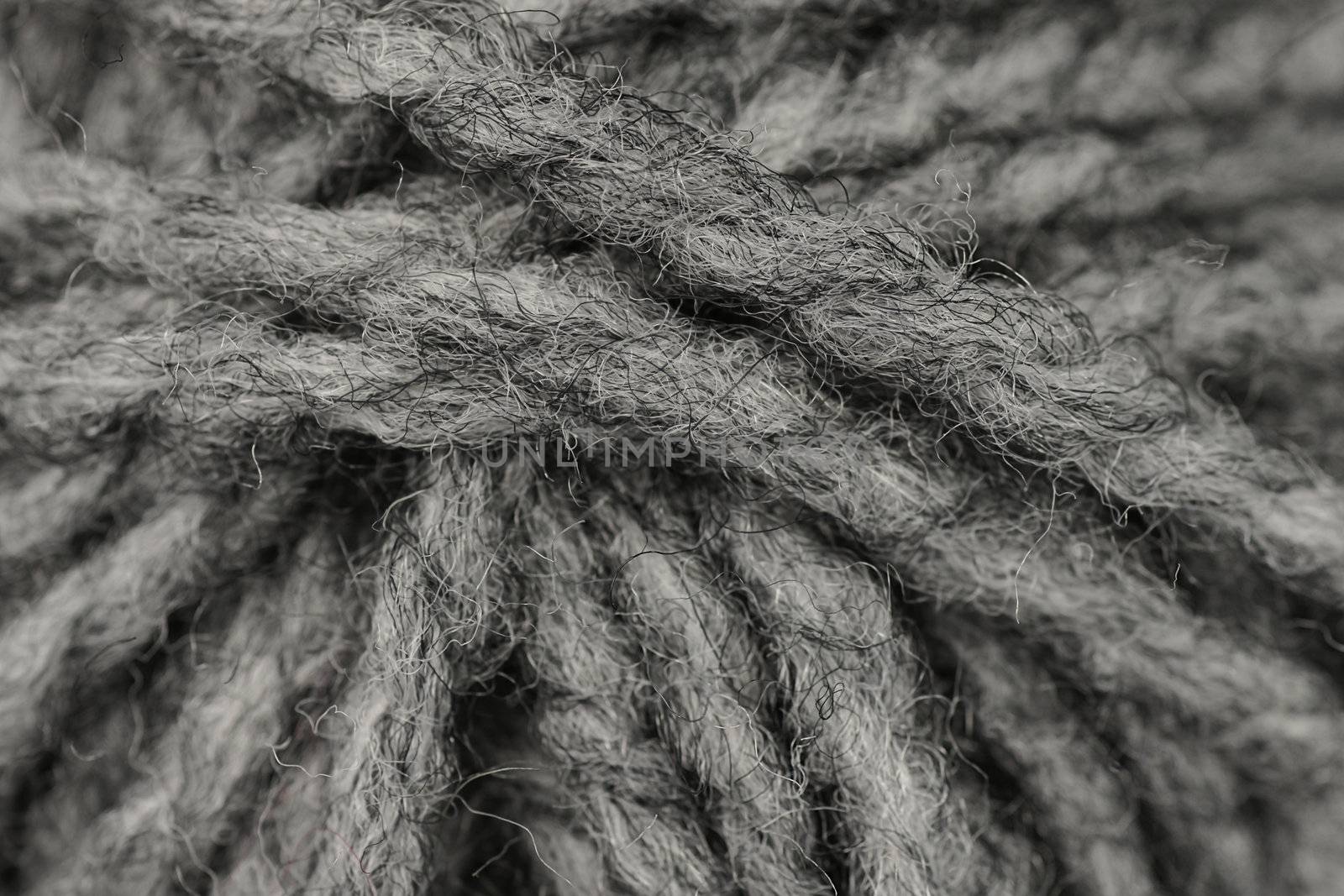 Macro shot of ball of grey wool or yarn by Mirage3