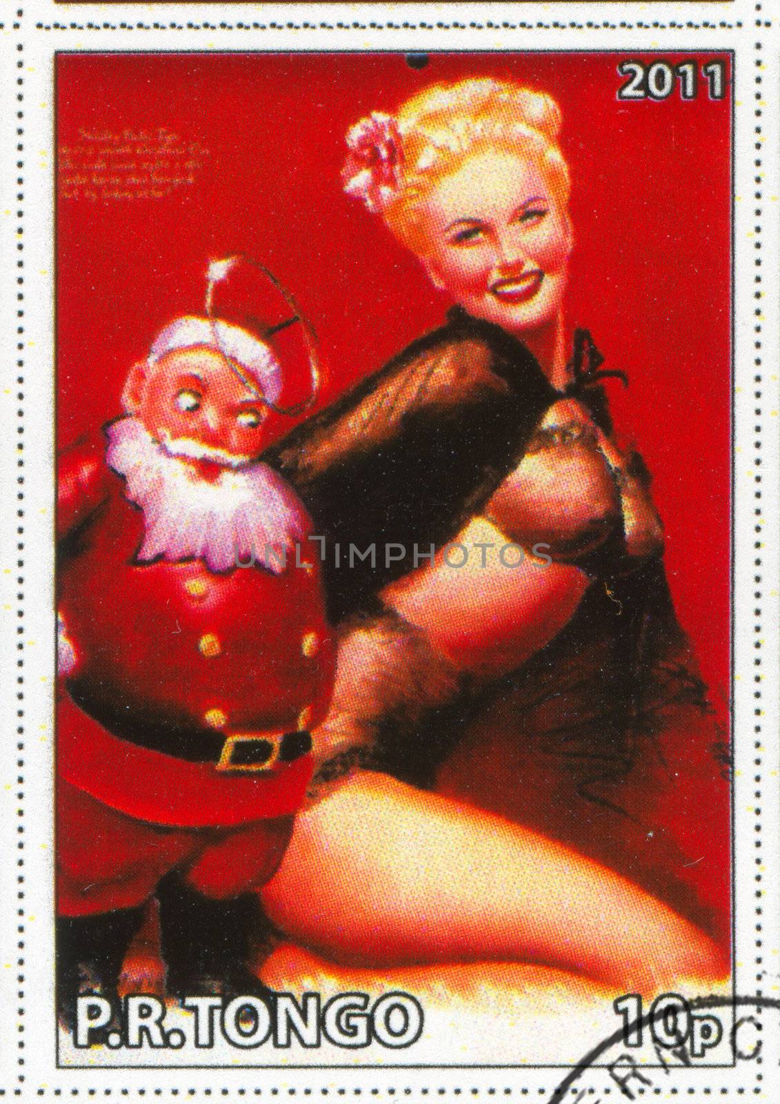 TONGO - CIRCA 2011: stamp printed by Tongo, shows Pin-up girl, by Earl MacPherson, circa 2011