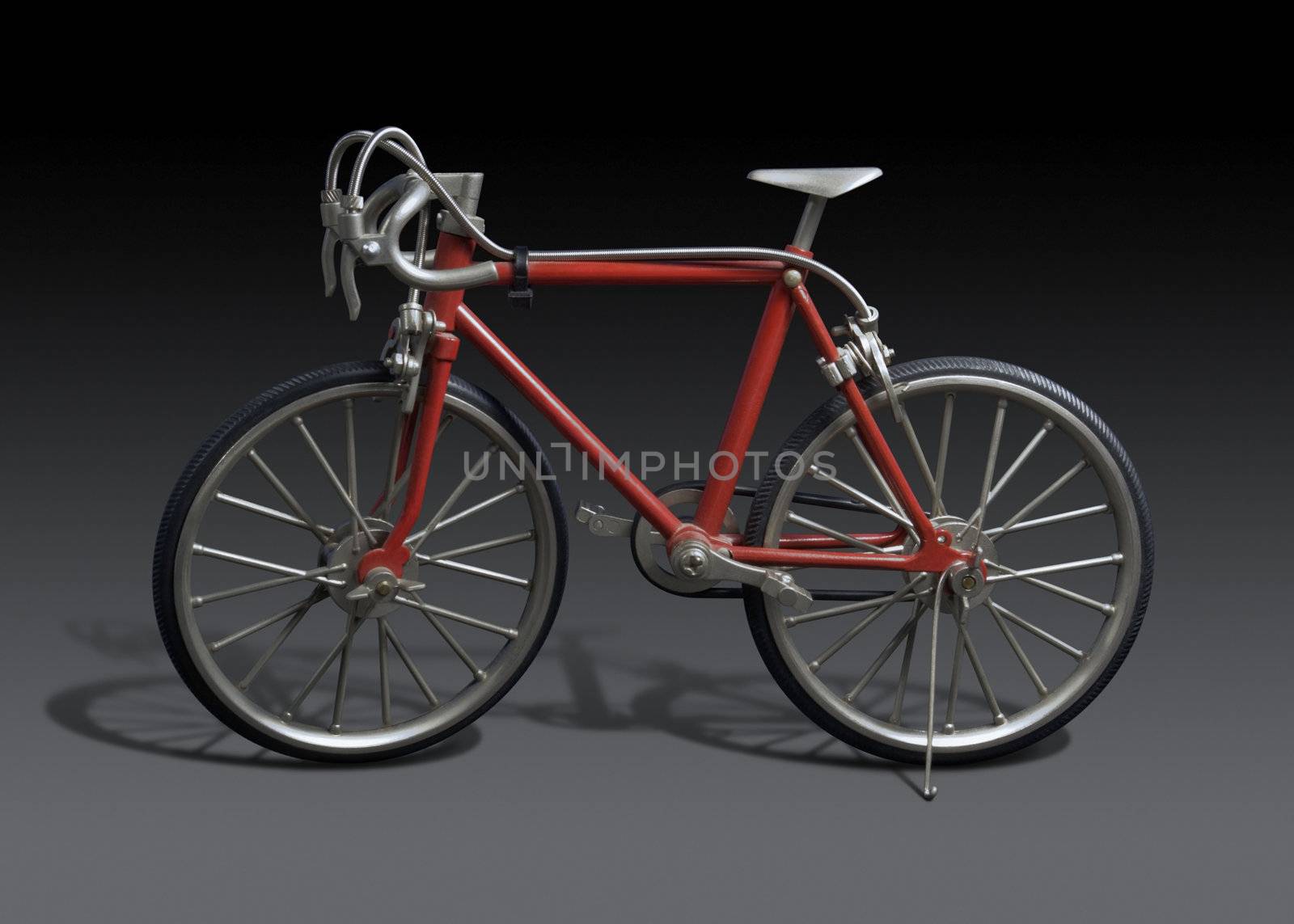 model of a red framed bicycle in dark grey back, with clipping path