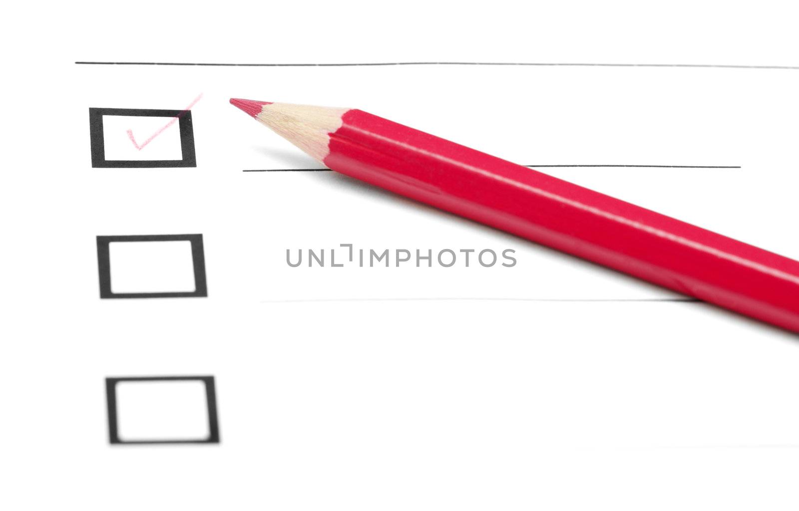 Red pencil on a inquiry form with checkboxes