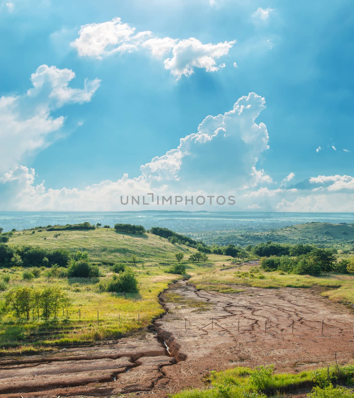 cloudy sky over drought earth