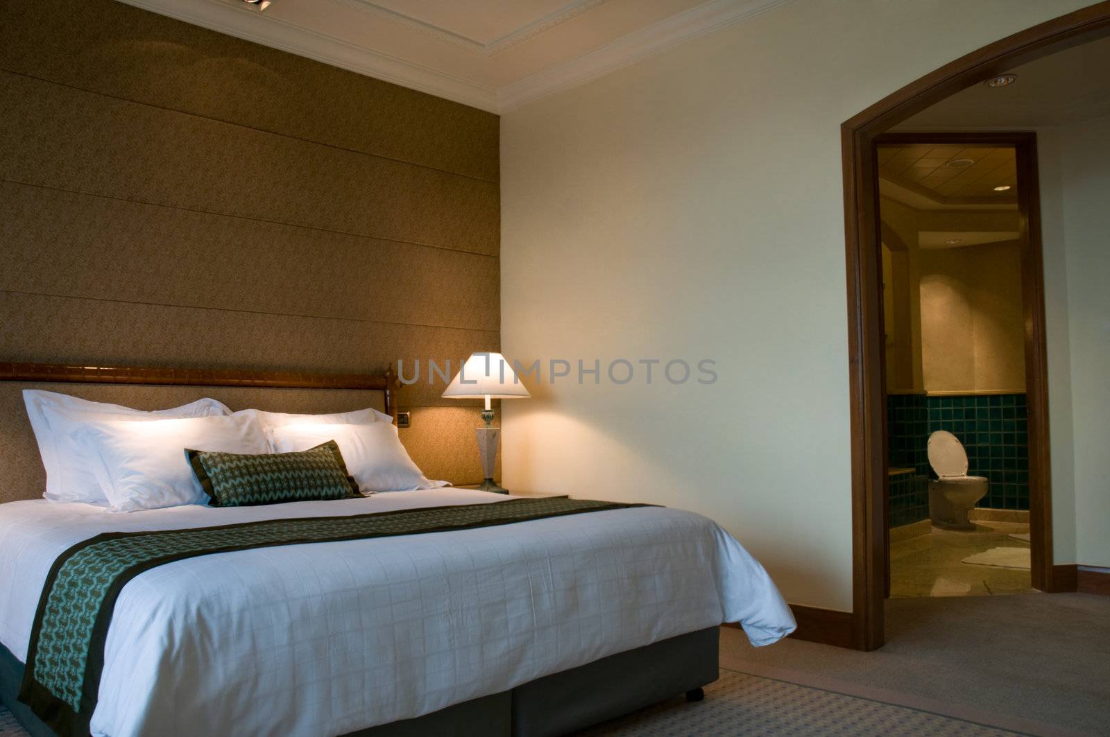 King size bed and luxury bathroom of a five star hotel suite room 