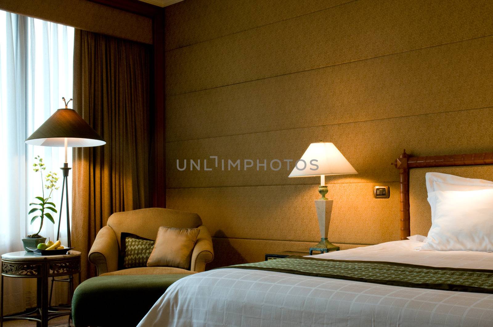 Bedroom of a elegant 5 star luxury hotel suite room 