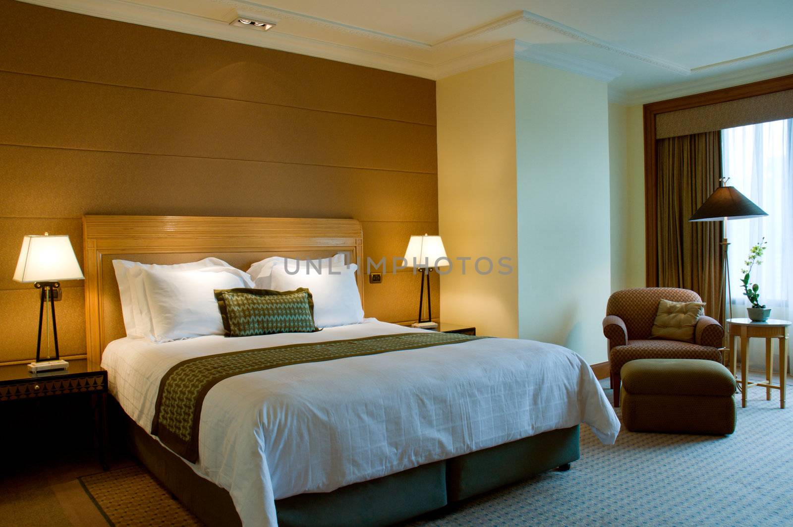 Bedroom of a elegant 5 star luxury hotel suite room 