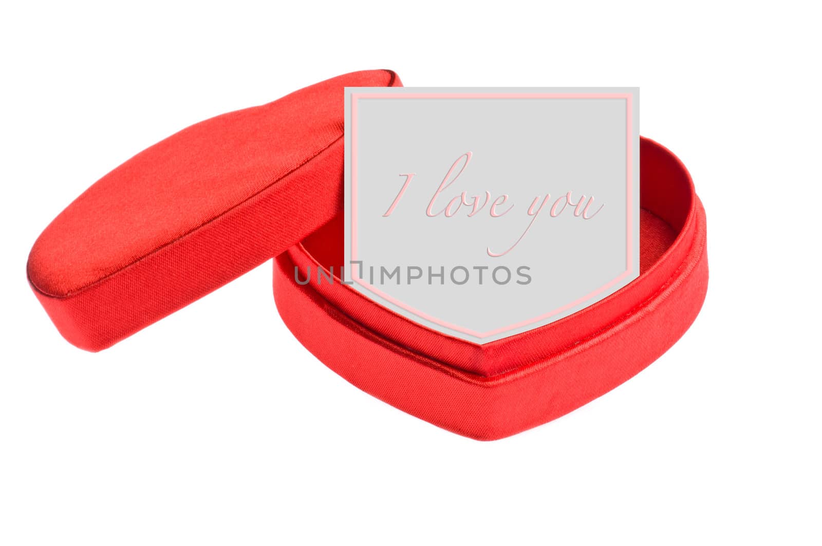 Red heart shape box with card "I love you"

