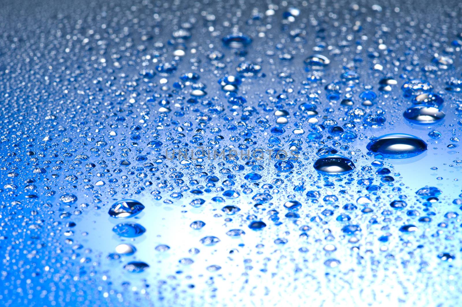 Water drops on a shiny surface by 3523Studio
