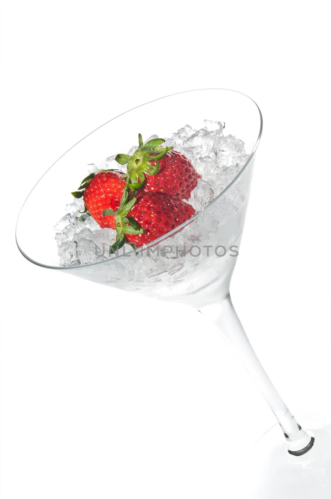Strawberry cocktail in a martini glass over white