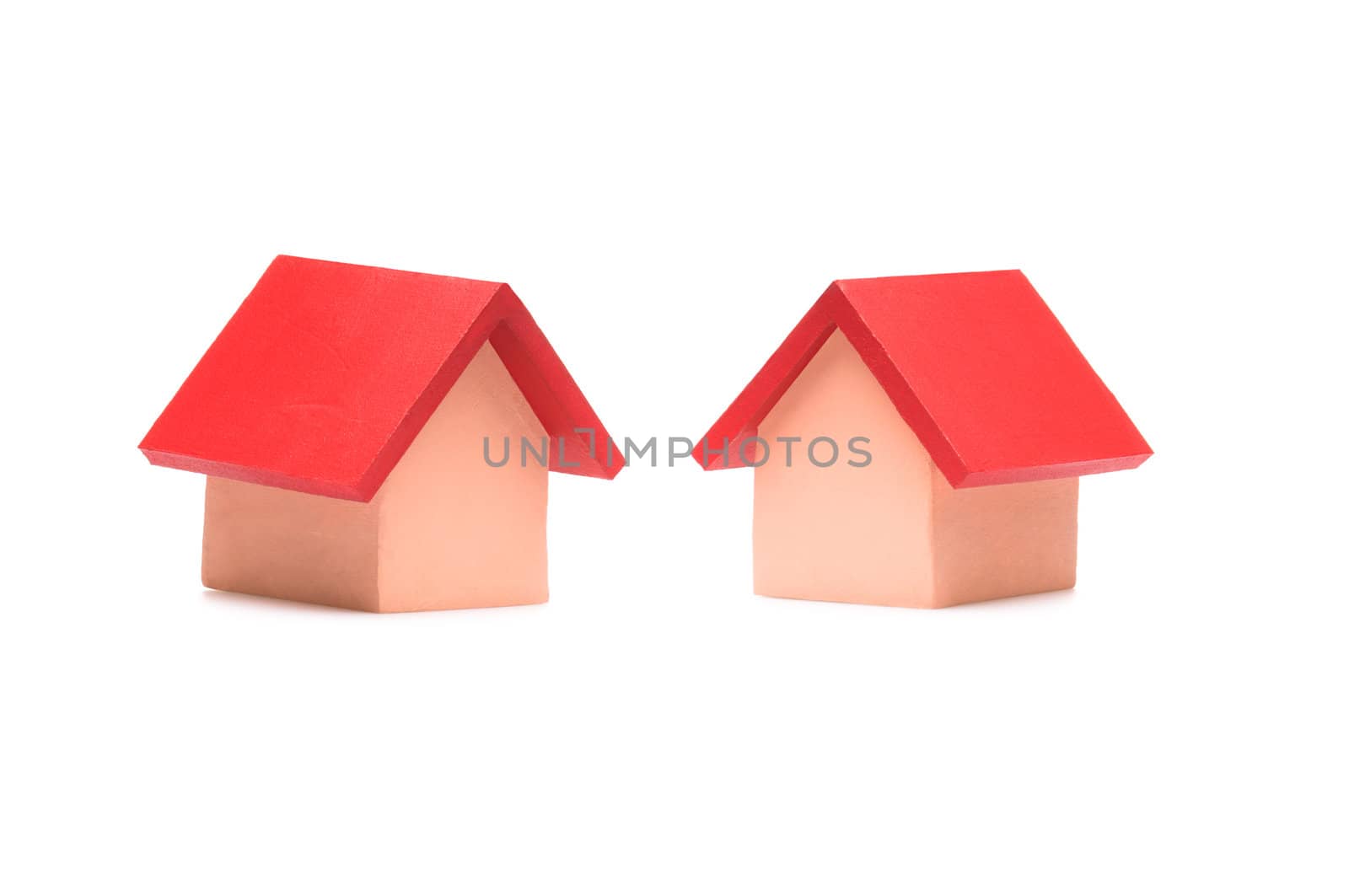 Small red roofed model house over white