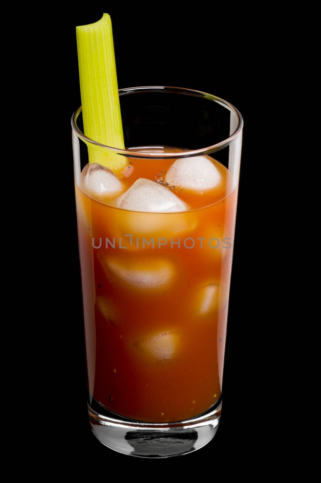 Bloody mary cocktail over a black background