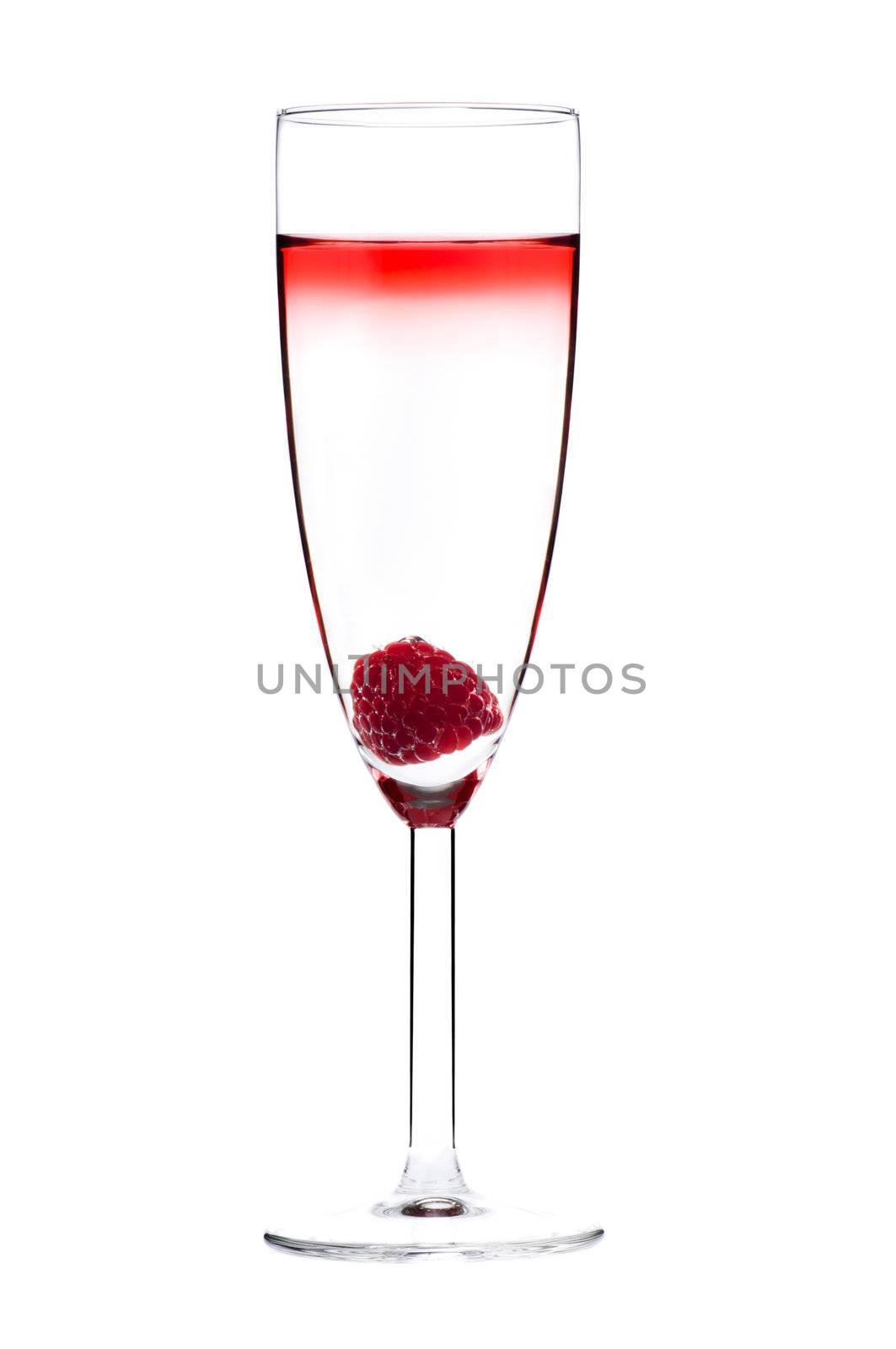 Designer cocktail isolated over white with raspberry in Champaign flute