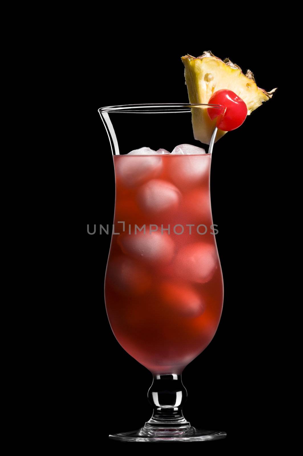 Singapore sling over black in a beautiful long drink glass