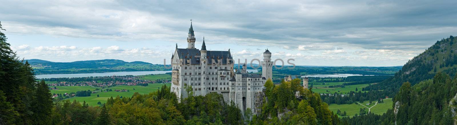 Castle Neuschwanstein with surrounding landscape in autumn