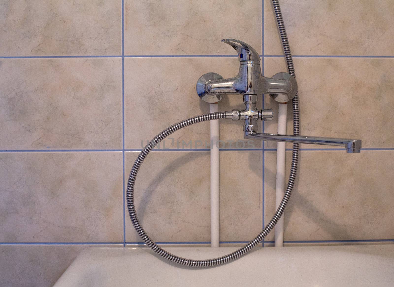Crome shower faucet turned to right side by vetdoctor