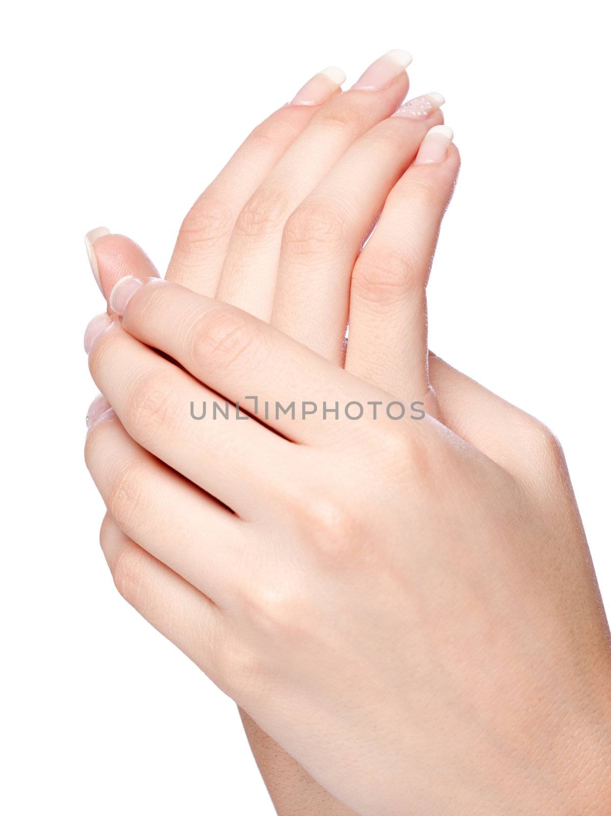 woman's hands with french manicure, isolated on white